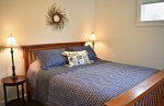 Sleep easy in the Queen bedroom with European style bedding